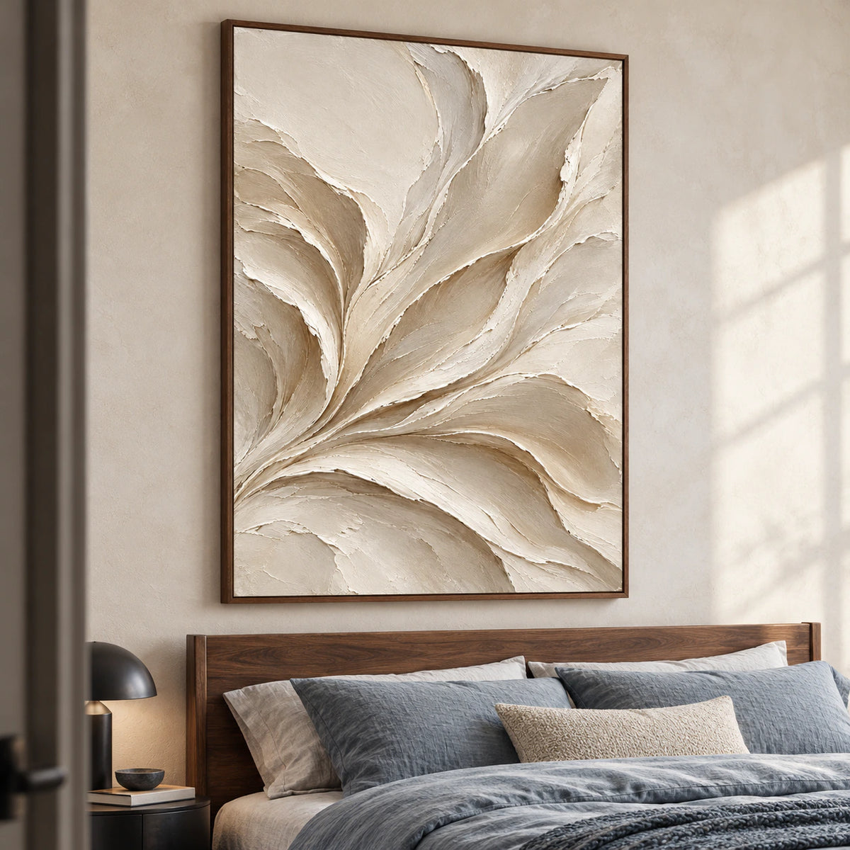 Sculpted-Drift displayed prominently above a walnut bed in a quiet, bright bedroom with restrained neutral furnishings.