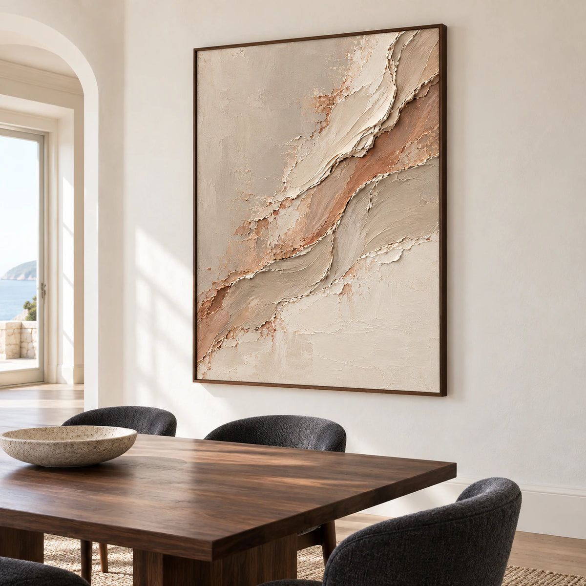 Prominent vertical artwork on a warm white dining room wall, seen from a left oblique angle above a dark wood dining table.