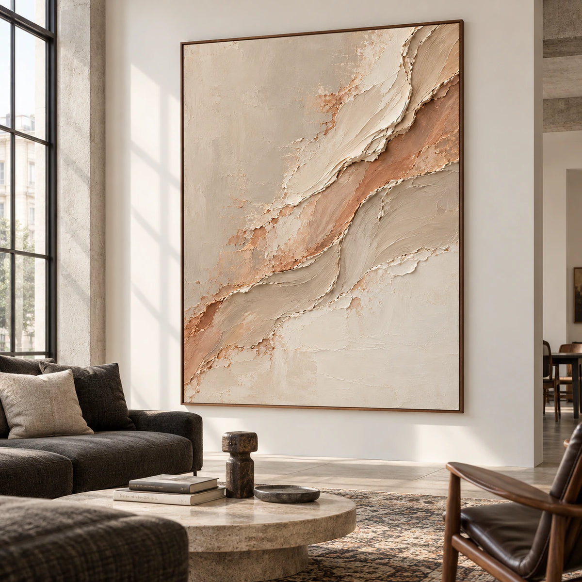 Large vertical artwork anchoring an expansive loft interior with broad windows, pale concrete walls and understated seating.