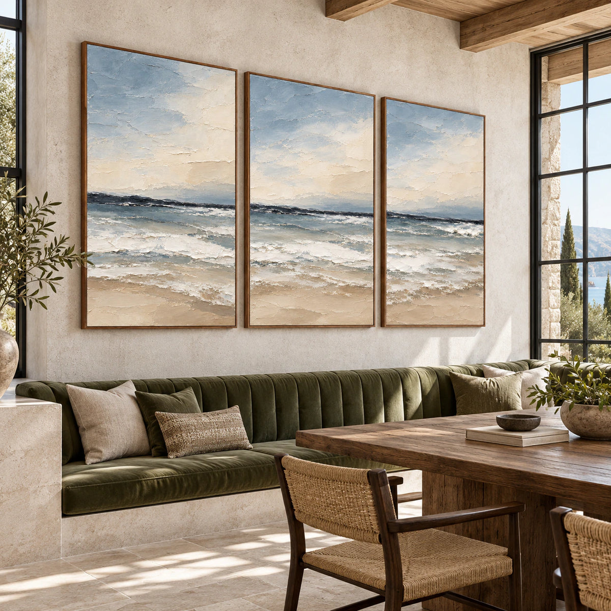 Expansive loft lounge with the Seafoam-Interval three-canvas coastal triptych.