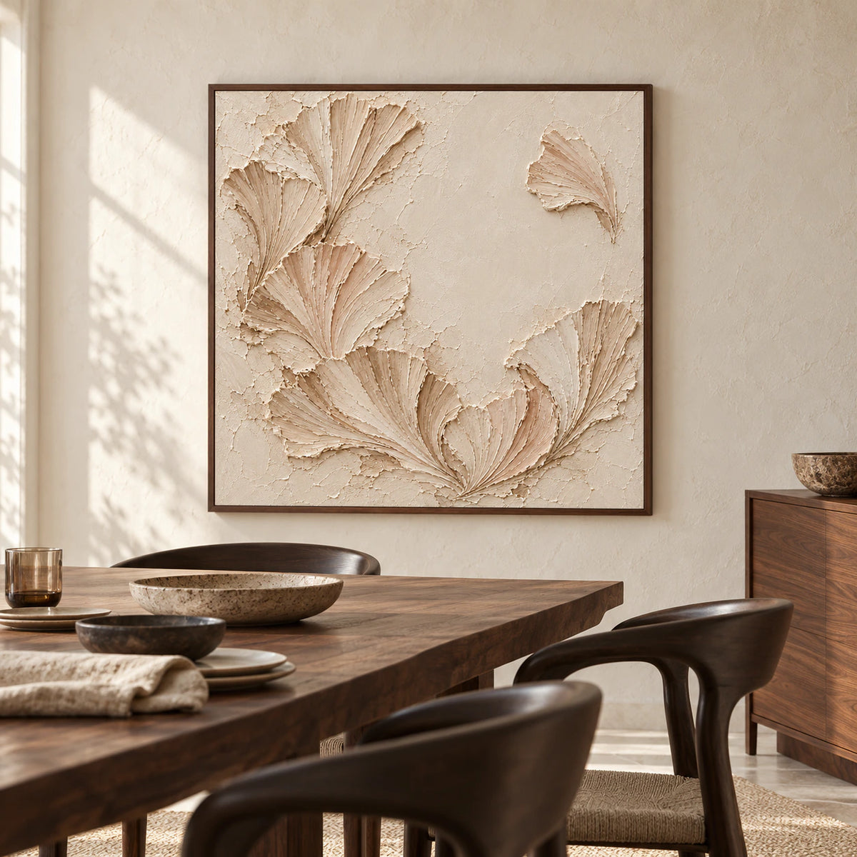 Large square Shell-Cadence artwork anchoring a refined dining room with a long dark wood table and sculptural chairs, viewed from the right.
