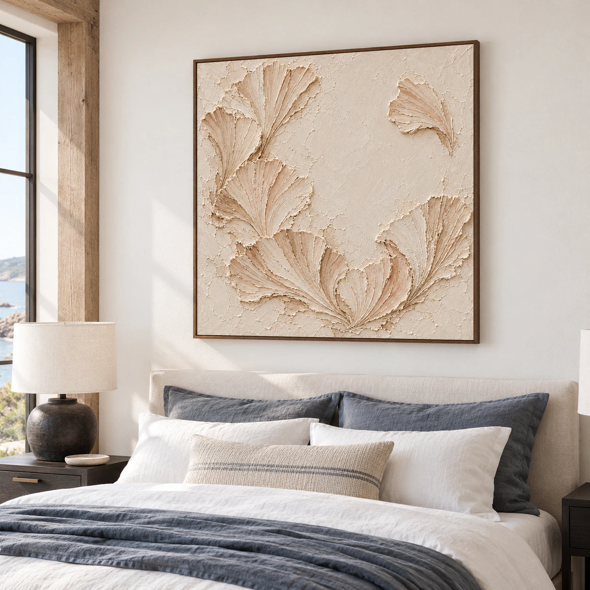 Large square Shell-Cadence artwork above a low upholstered bed in a quiet, sunlit bedroom with pale linen and dark wood accents.