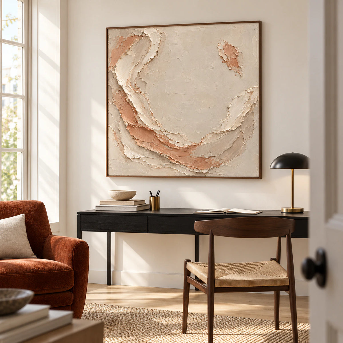 Shell Mantle brings sculptural texture to an airy home office, displayed above a simple black desk beside a tall window.