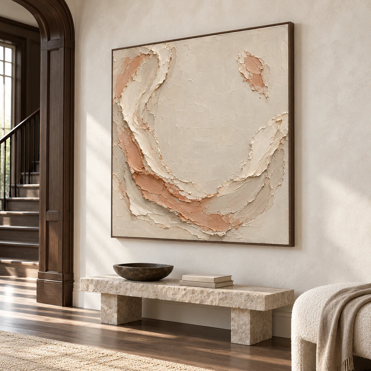 Shell Mantle commands a gallery-scale foyer wall above a restrained stone bench, with daylight falling across the open architectural space.