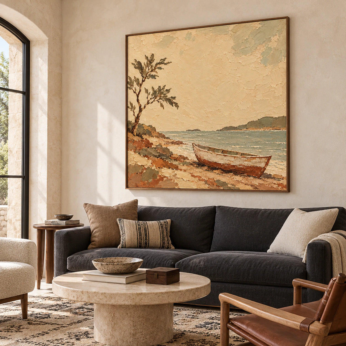 Large square shoreline painting above a low sofa in a bright living room.
