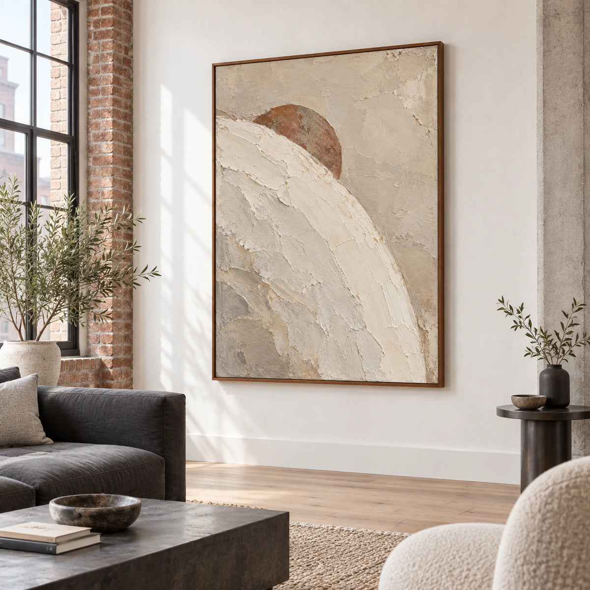 Large Sienna-Arc painting above a restrained sofa in a bright contemporary living room.