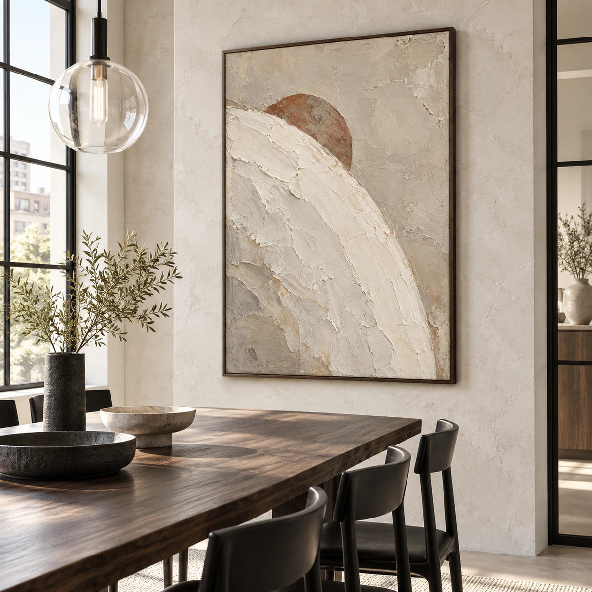 Large Sienna-Arc painting in a refined daylight-filled dining room with sculptural furnishings.
