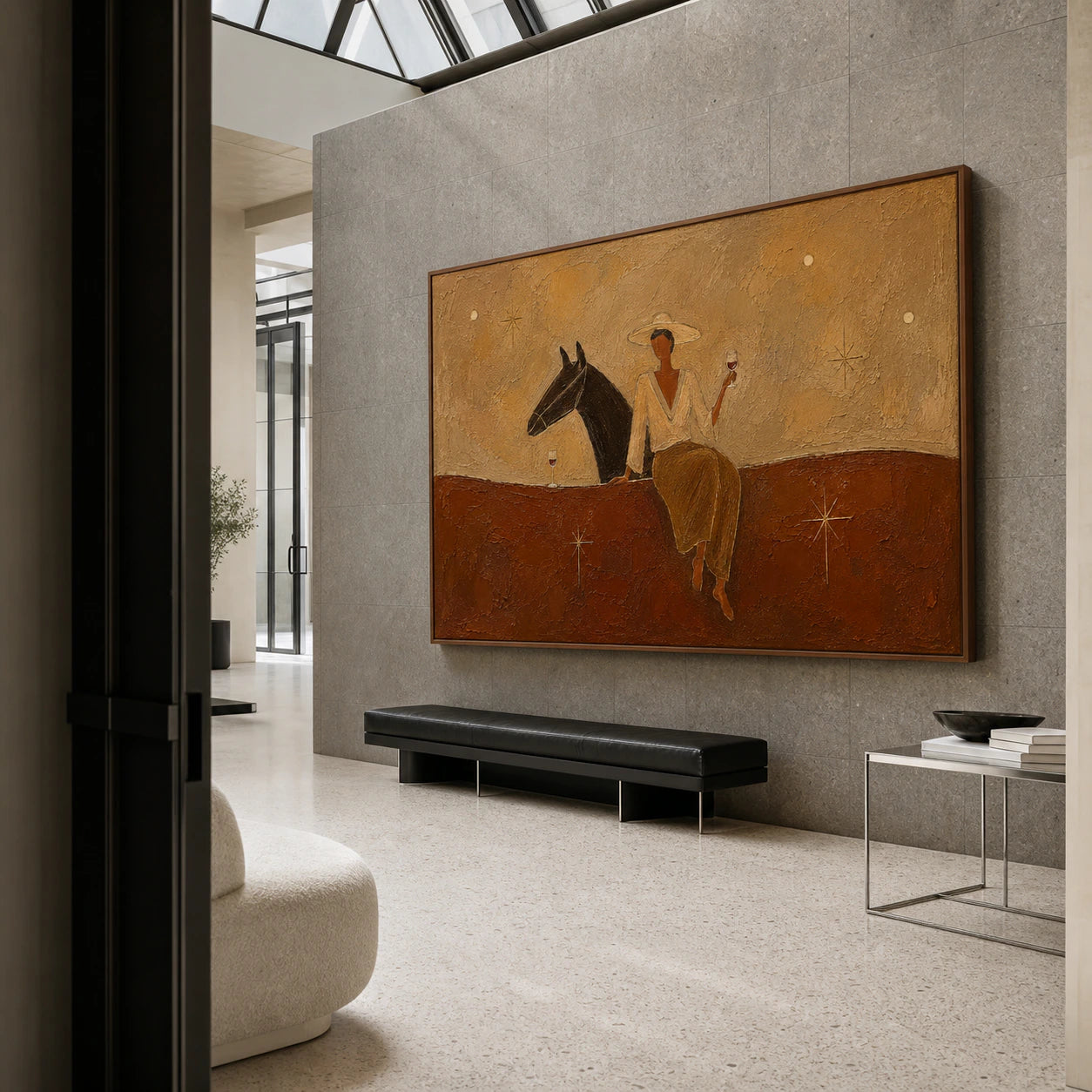 Monumental Sienna-Companion painting commanding a skylit gallery foyer with gray stone walls and a black bench.
