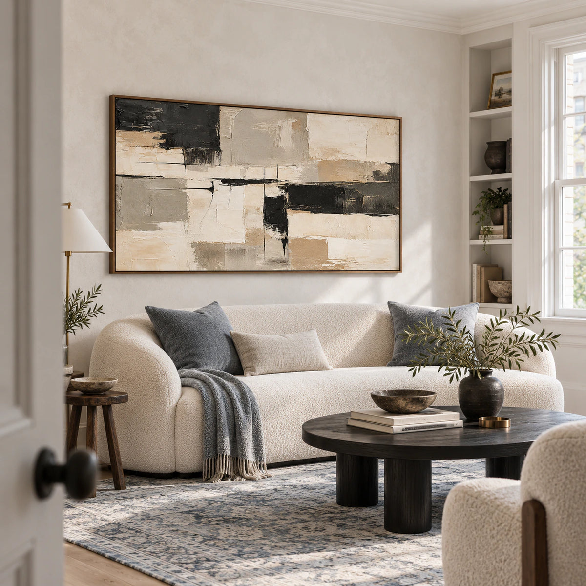 Silent-Grid as the focal artwork above a sculptural sofa in a bright living room.