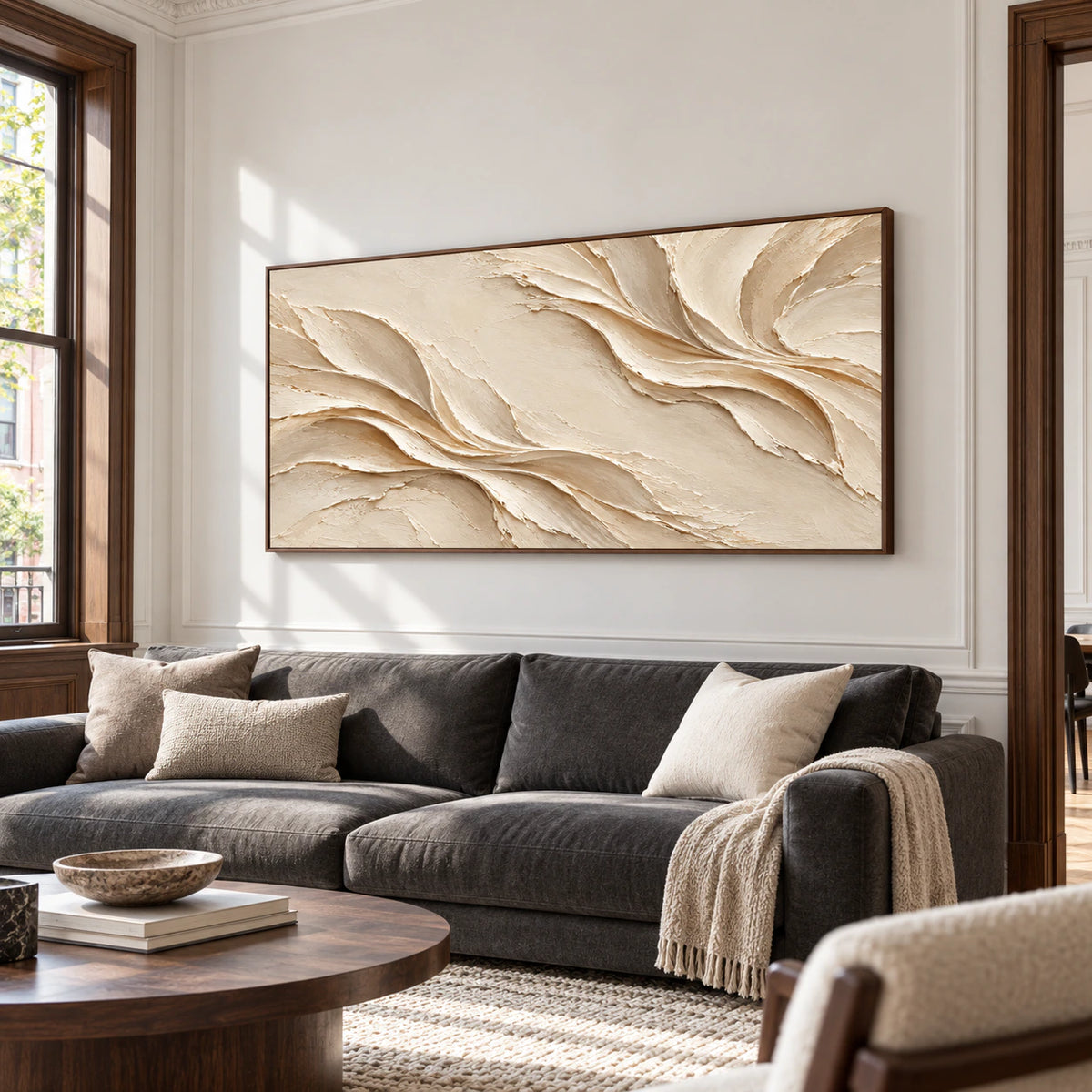Silken-Rills displayed as the focal point of a bright living room, its ivory sweeping folds clearly visible above a restrained charcoal sofa and pale stone floor.