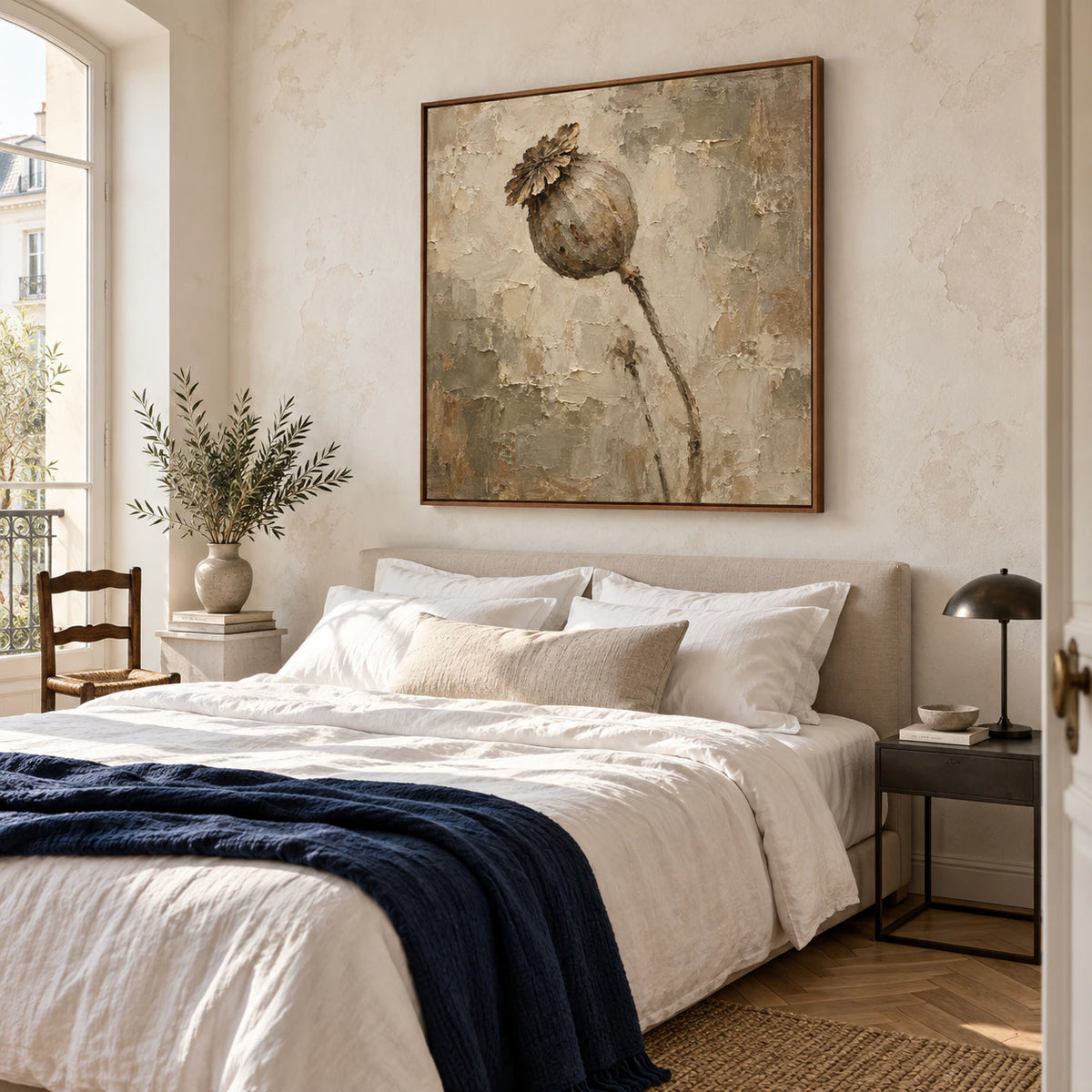 Earth-toned square floral artwork above a quiet, naturally lit bedroom.