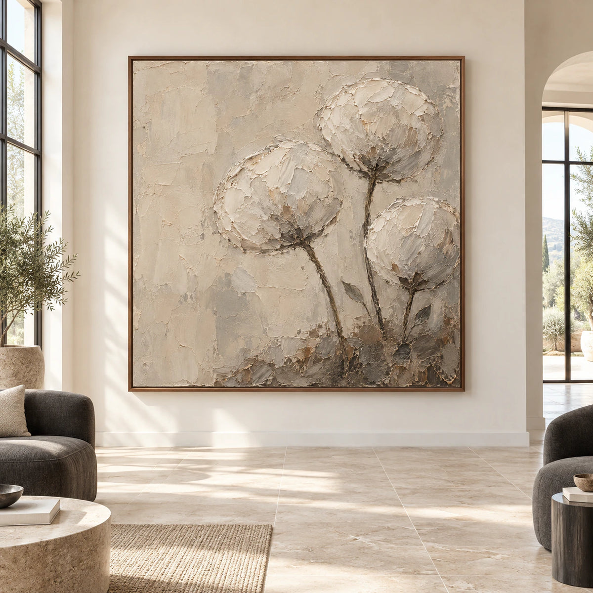 Large square floral artwork with textured ivory blooms displayed straight-on in a spacious daylight interior.