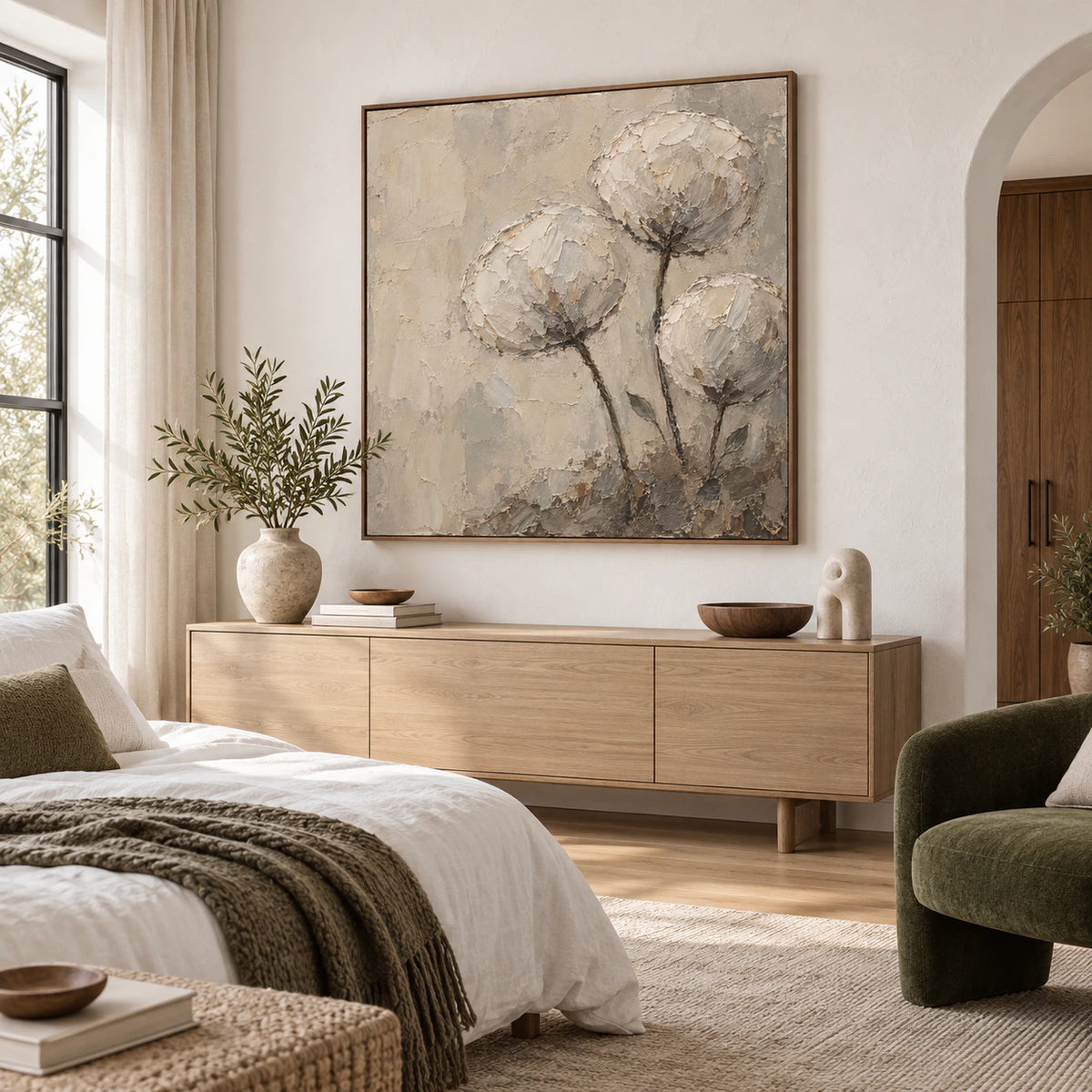 Textured ivory floral painting above a quiet bedroom console in soft daylight.