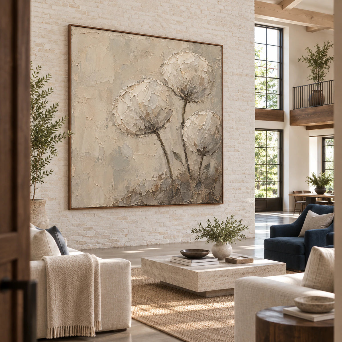 Square ivory and taupe floral artwork featured in an expansive loft hospitality interior.