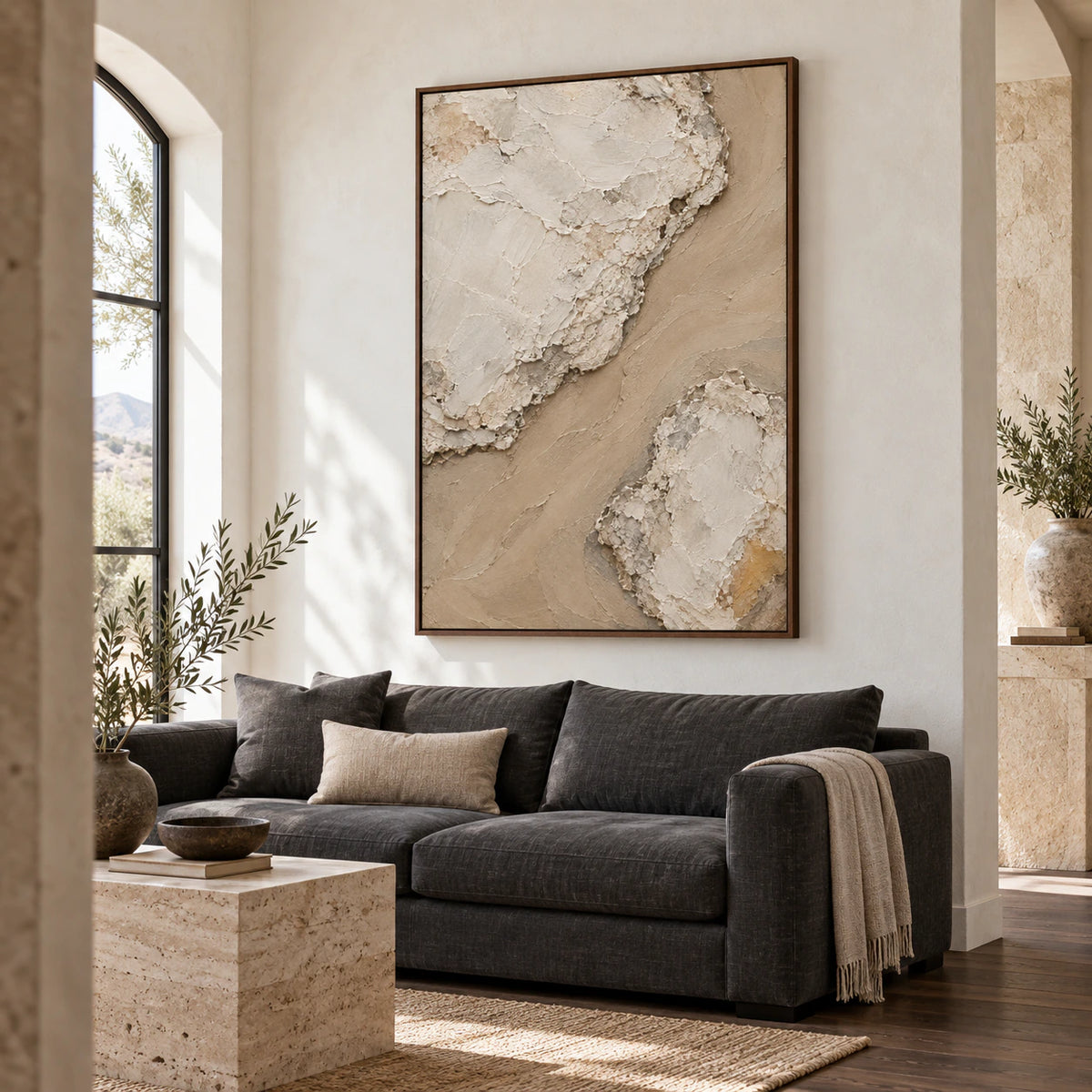 Silt-Ravine above a restrained sofa in a bright contemporary living room.