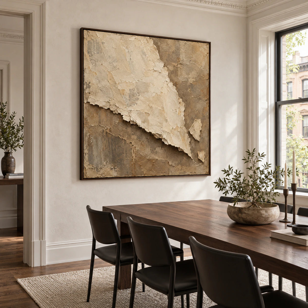 Square ivory and taupe textured artwork in a refined daylight-filled dining room.