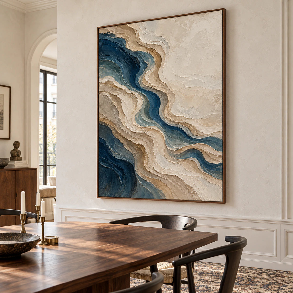 Vertical abstract painting with a winding blue channel displayed in a refined dining room.