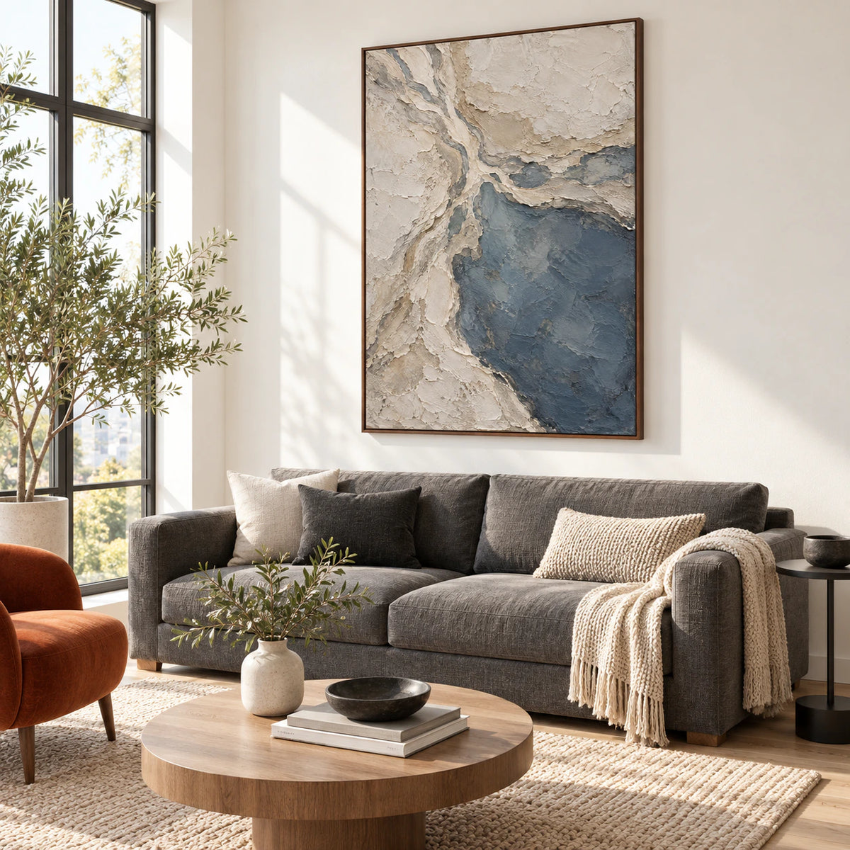 Slate-Confluence above a restrained sofa in a bright contemporary living room.