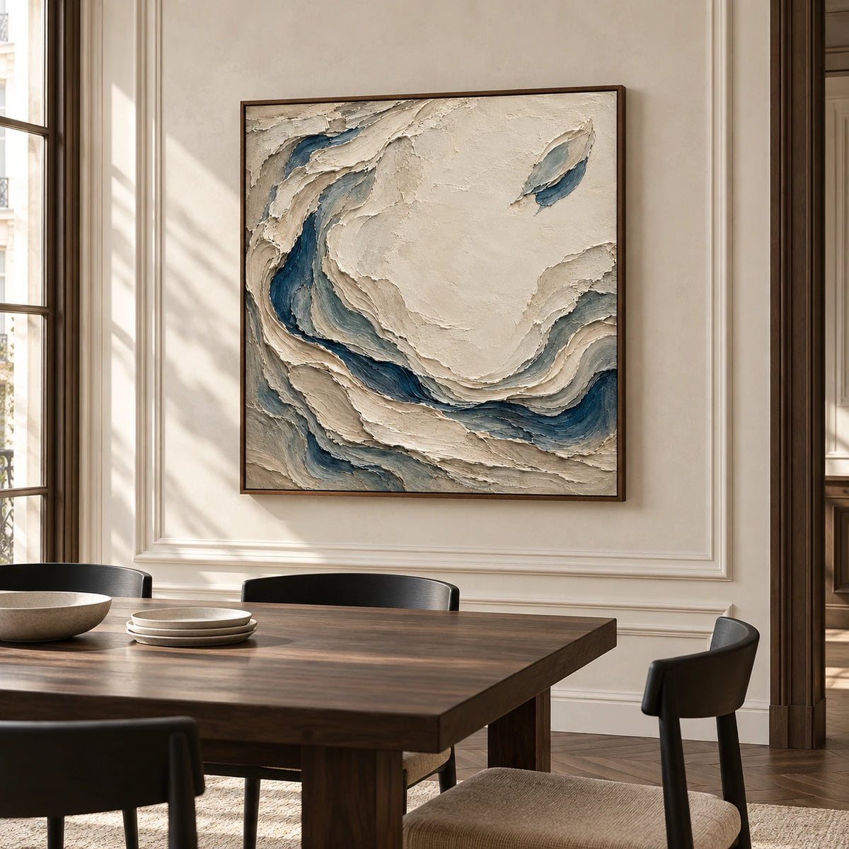 Square Slate-Eddies artwork displayed prominently on a pale stone dining room wall above a dark wood table in natural daylight.