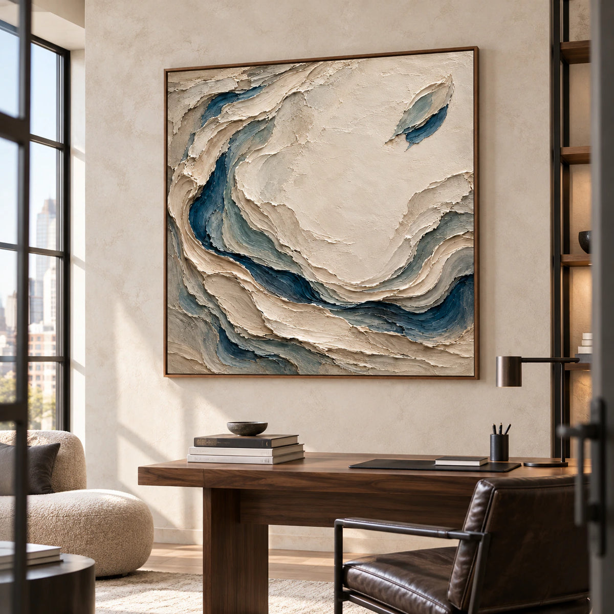 Square Slate-Eddies artwork above a restrained desk in an airy home office, framed by daylight and soft neutral furnishings.