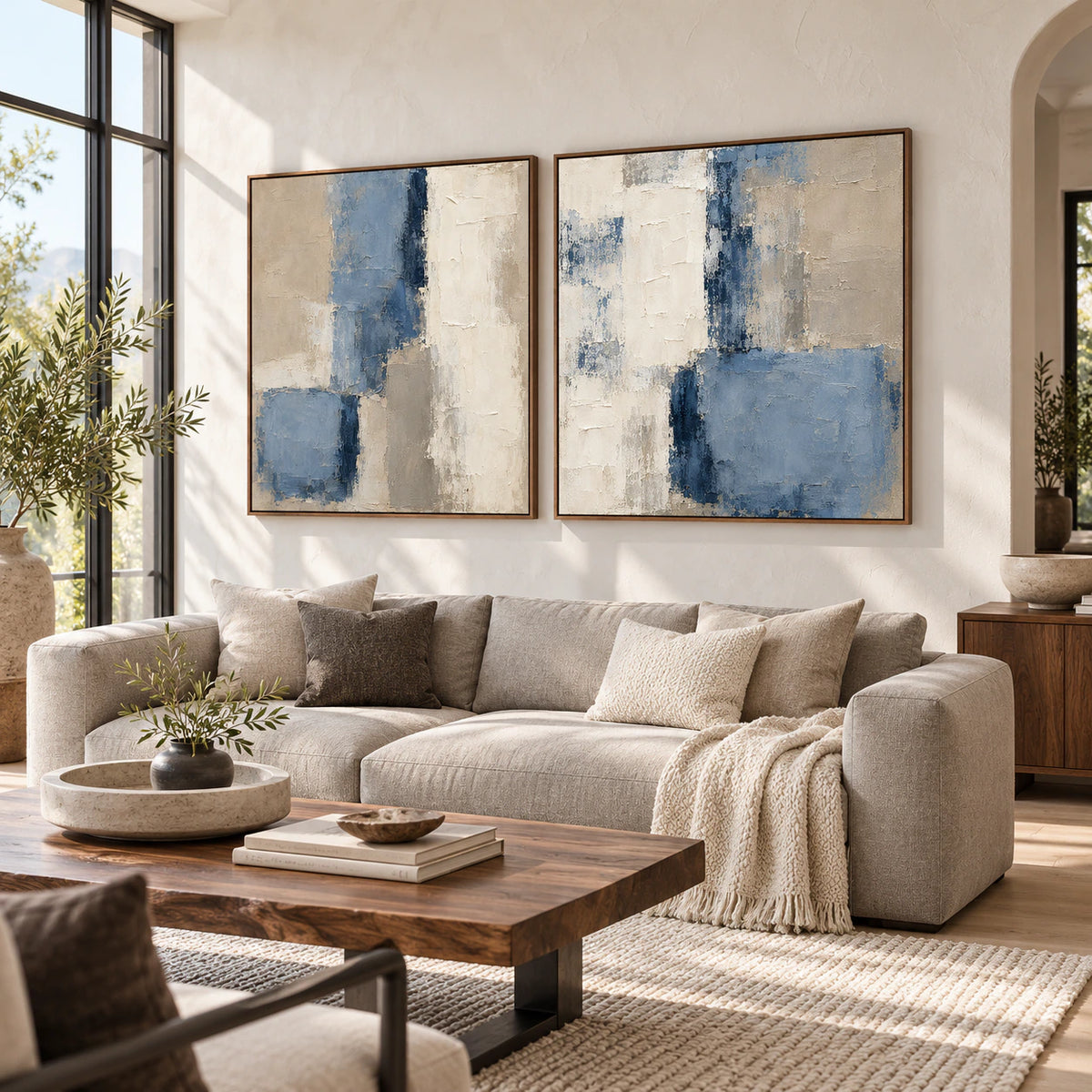 Slate-Interval textured diptych displayed above a sofa in a bright living room.