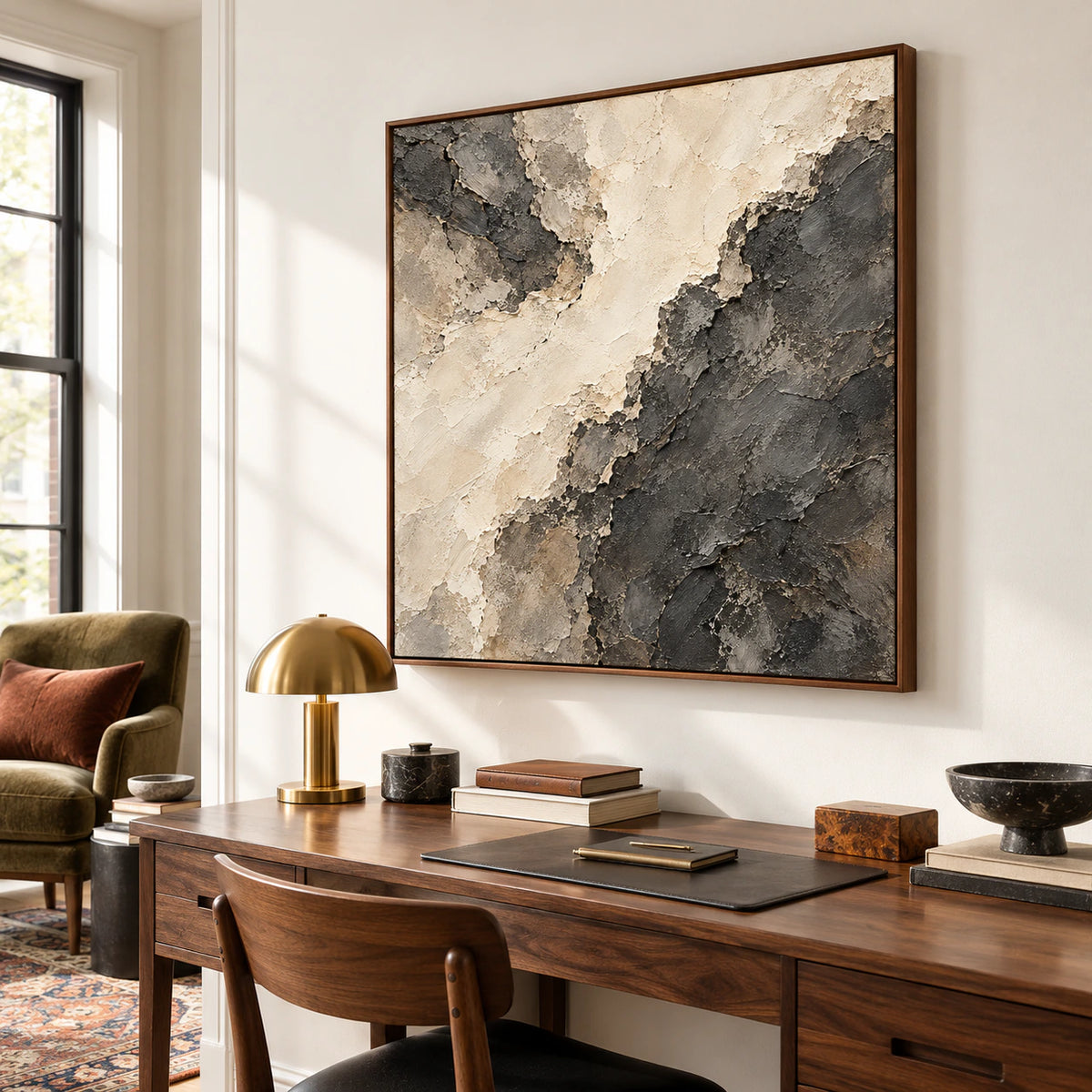 Soot-Divide above a simple desk in a bright home office with a dark wood chair and a separate reading chair, viewed from the right at eye level.