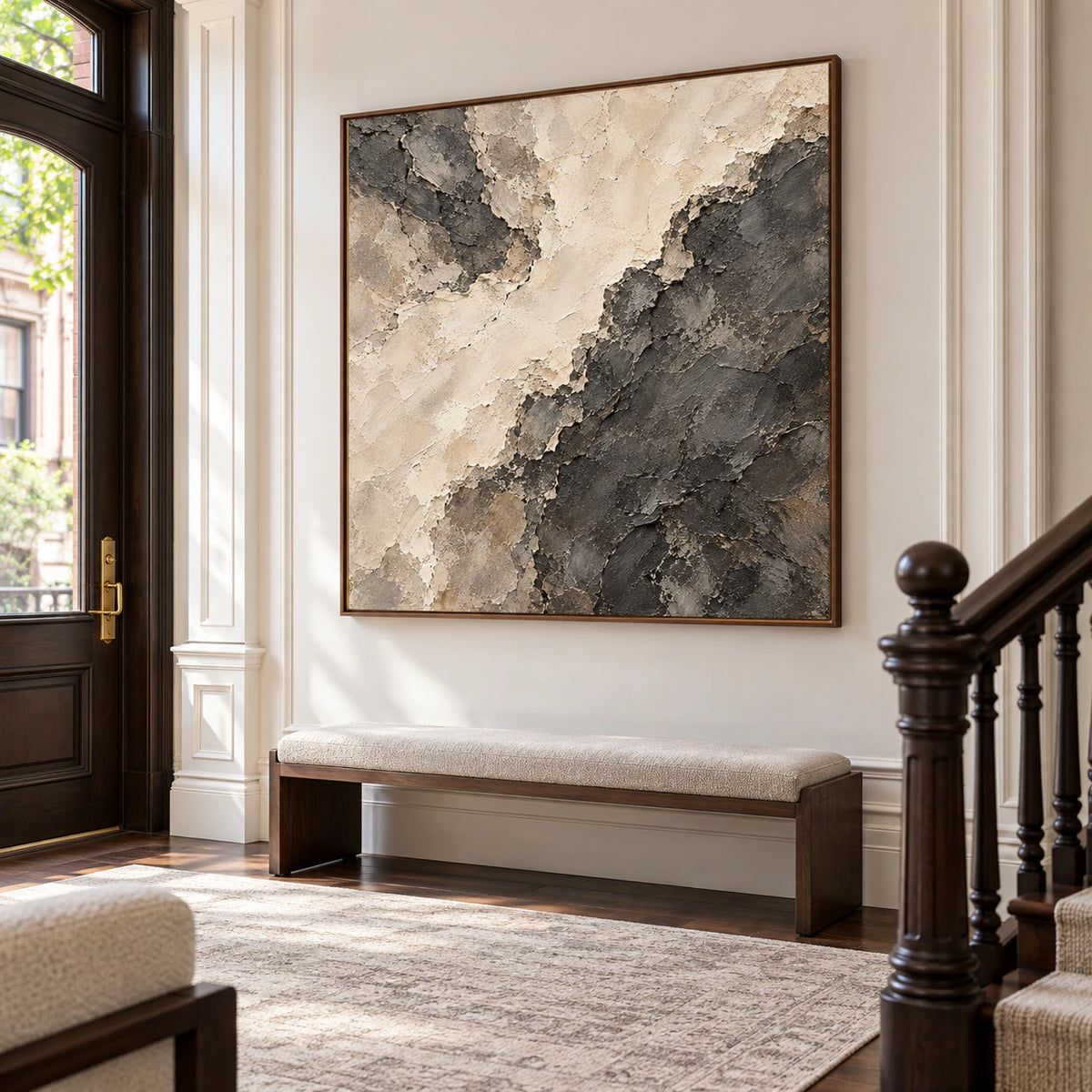 Soot-Divide displayed prominently in a bright, tall foyer with pale walls and a bench, viewed slightly from the left at a distance.