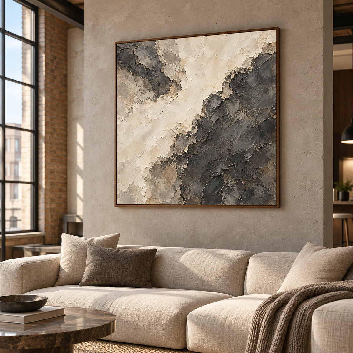Soot-Divide above low seating in an expansive loft hospitality space with tall windows and open architecture, viewed from the right at an elevated angle.