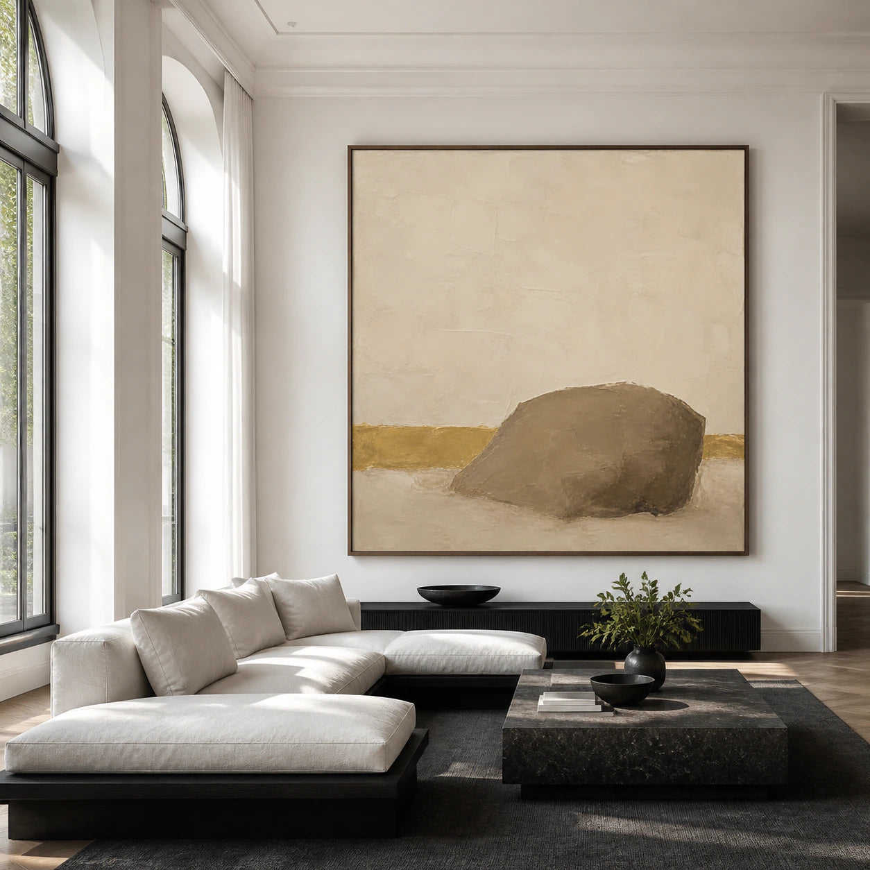 Still-Embankment as the focal point above a neutral sofa in a bright living room.