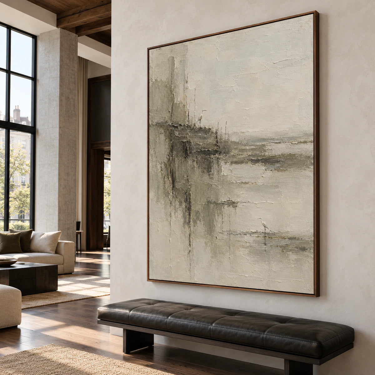 The artwork is prominently displayed in an expansive loft interior with restrained furnishings.