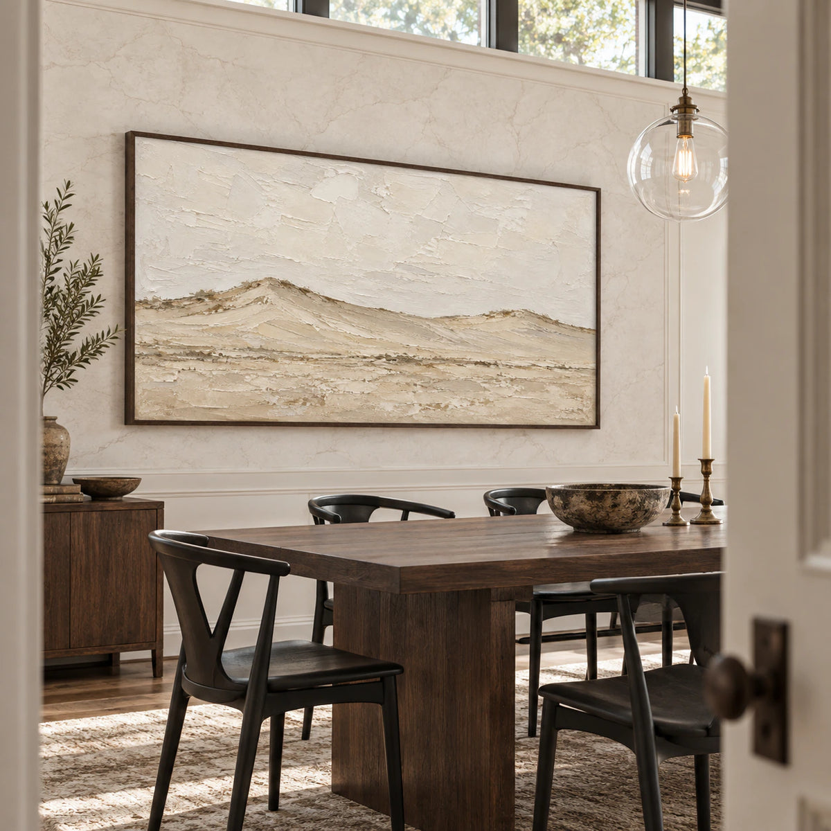 Still-Ridge anchoring a refined daylight dining room.