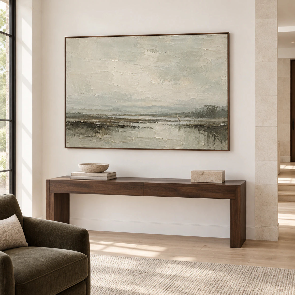 Oversized marsh painting presented on the main wall of a bright gallery-scale foyer, its horizontal composition clearly legible.