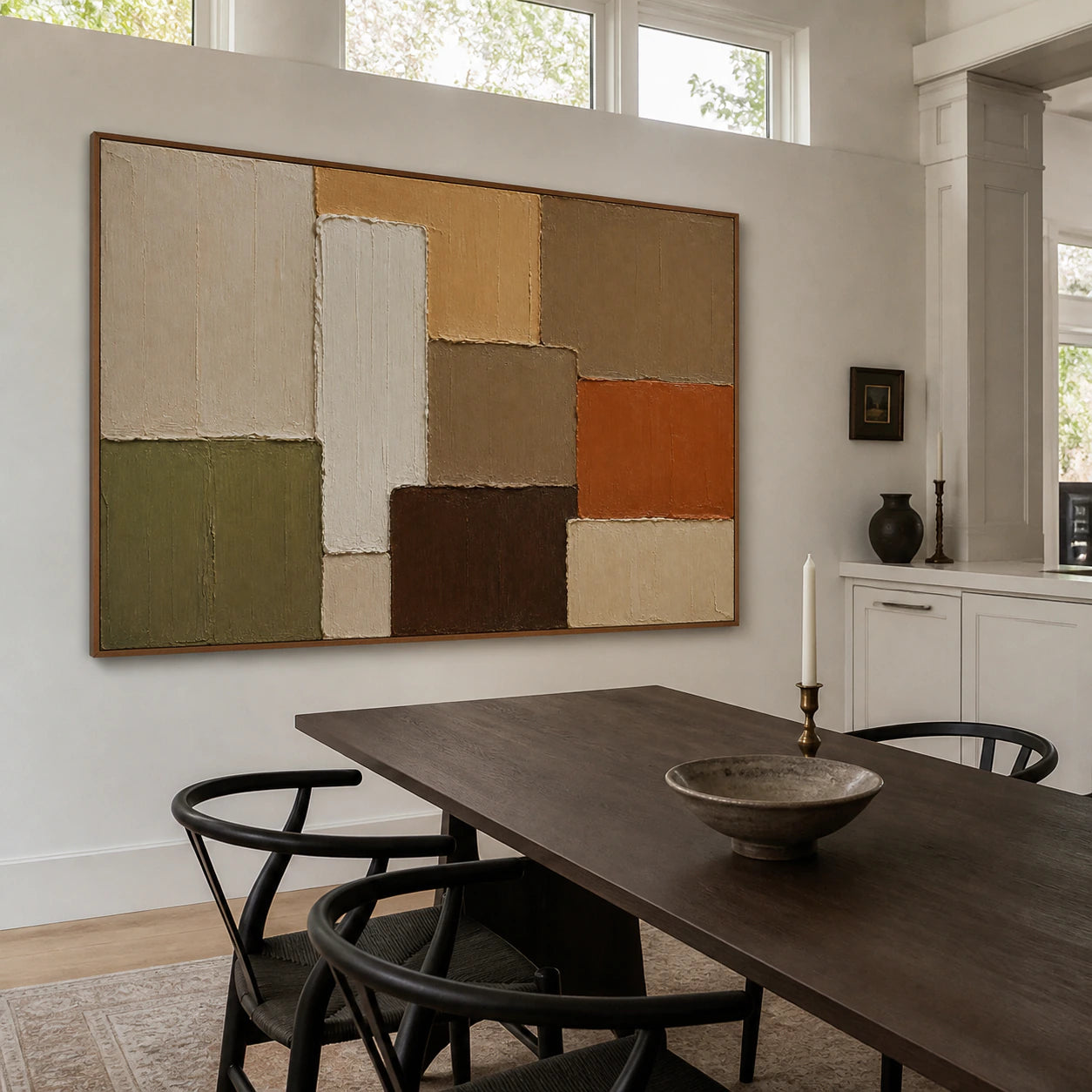 Sundried-Relief as the focal point of a refined daylight dining room.