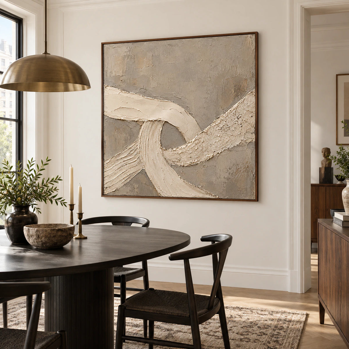 Square ivory and taupe textured abstract artwork in a refined daylight dining room.
