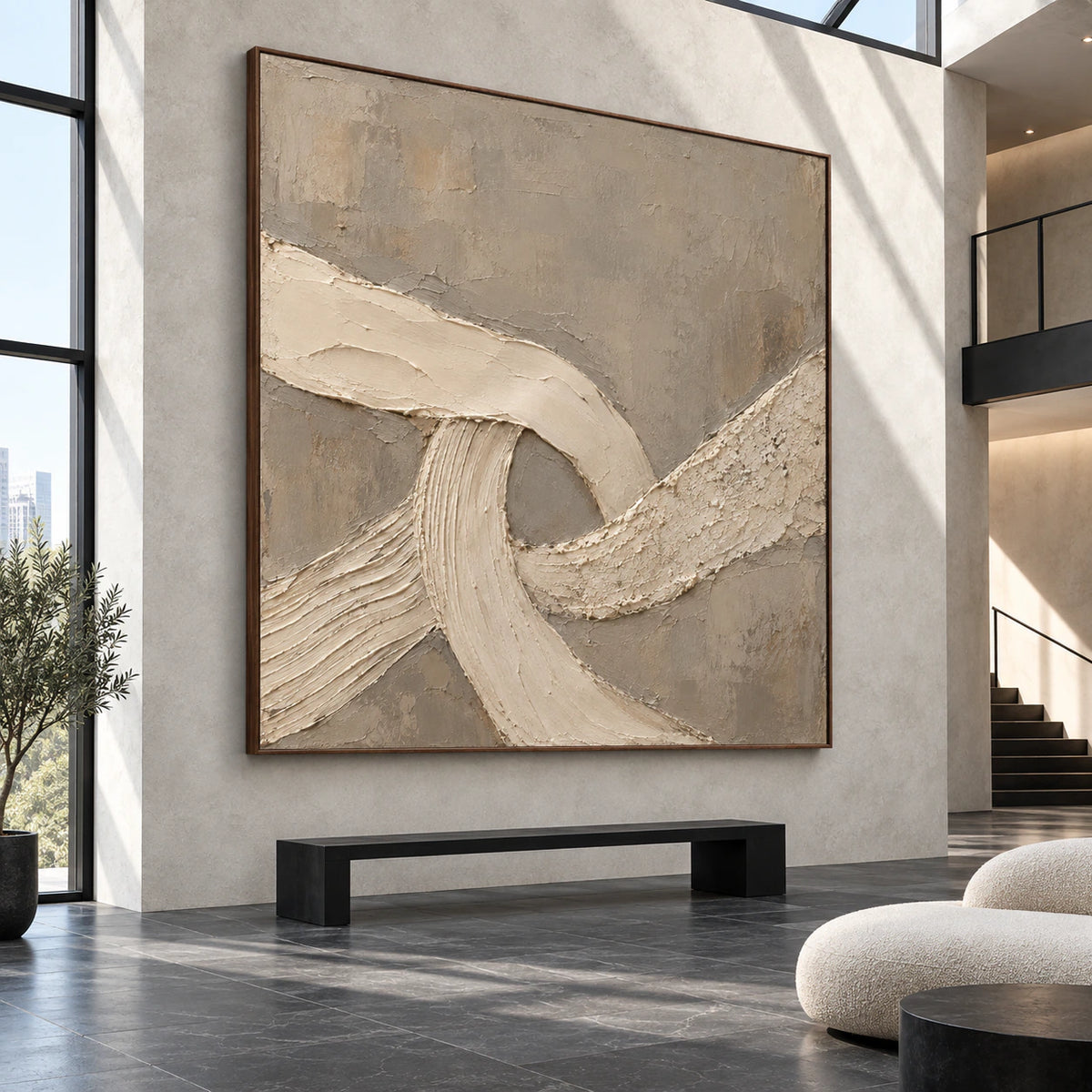 Large square textured abstract artwork in a gallery-scale foyer.