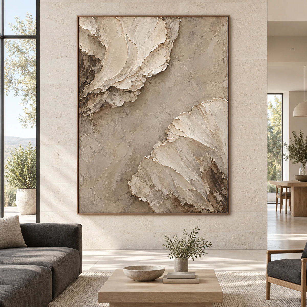 Large textured ivory and sand abstract painting shown straight-on in a spacious daylight interior.