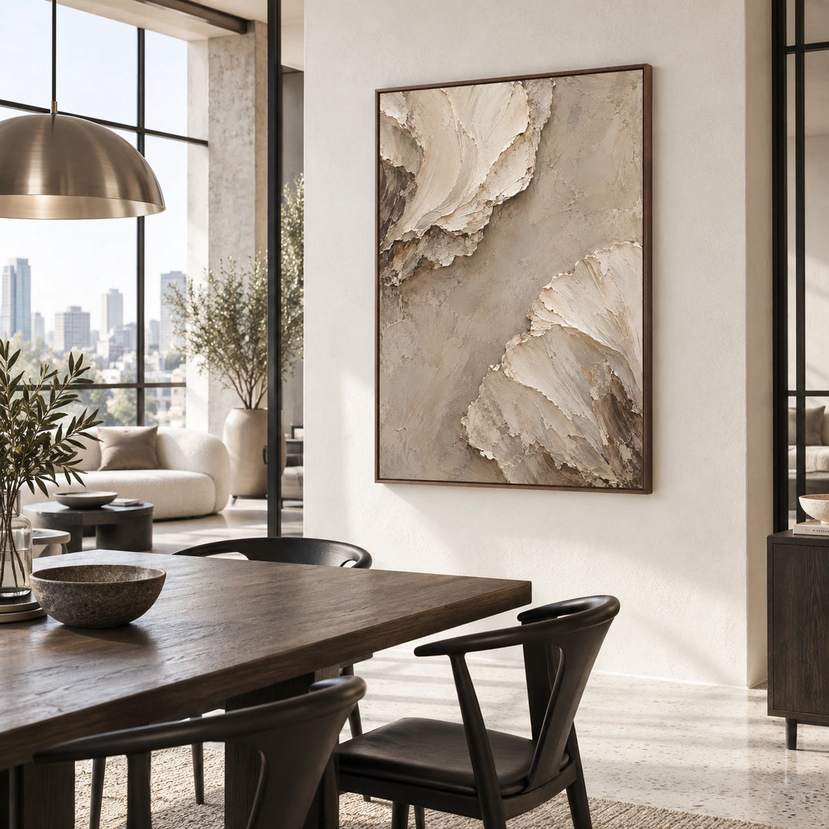 Vertical neutral textured painting in a refined daylight dining room.