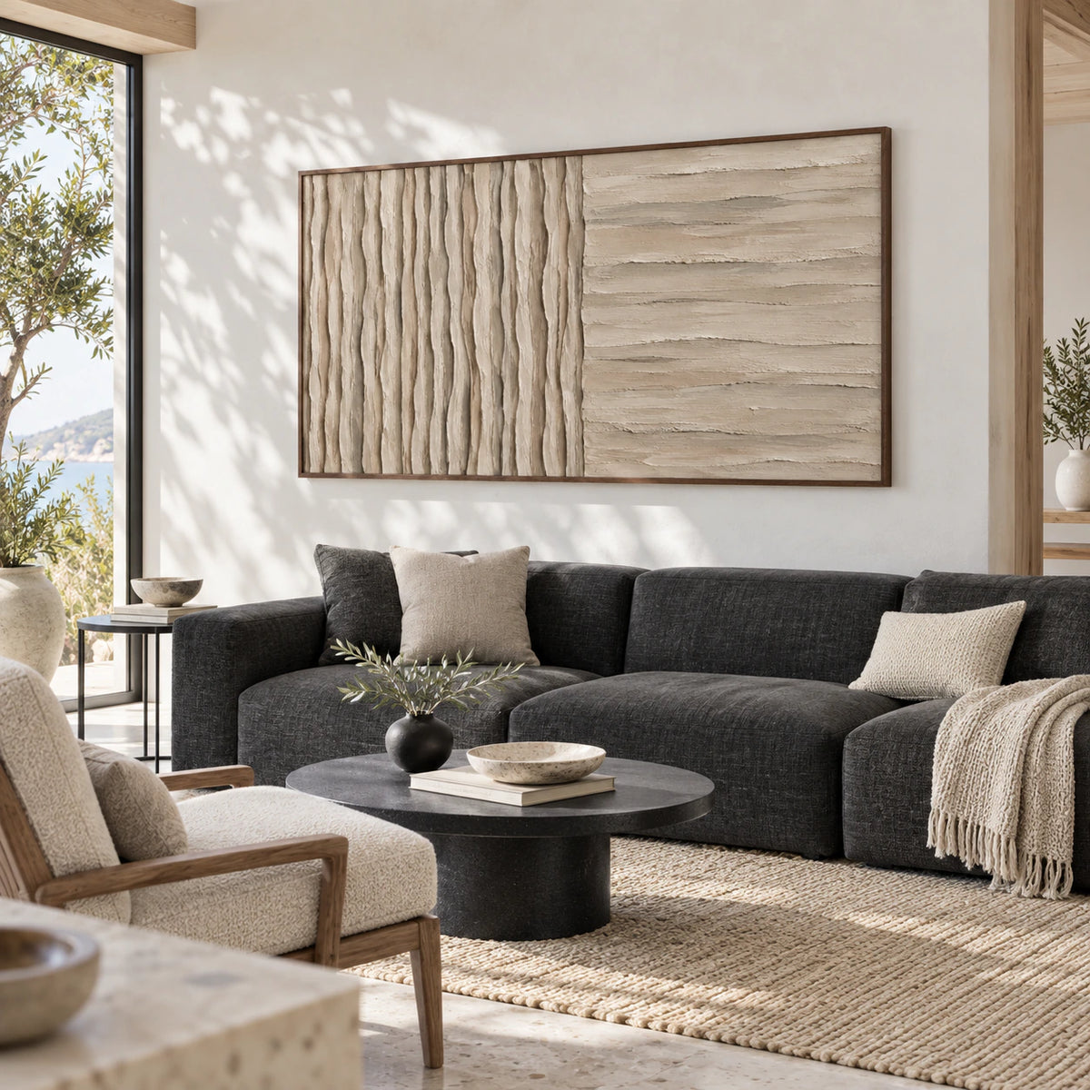 Tactile-Divide above a restrained sofa in a bright contemporary living room.