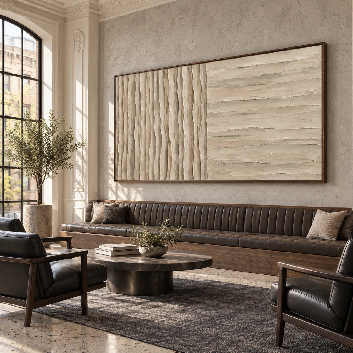 Tactile-Divide anchoring an expansive daylight-filled hospitality loft interior.