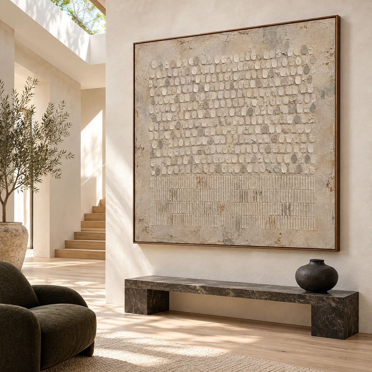 Large square textured abstract painting as the focal point of a gallery-scale foyer.