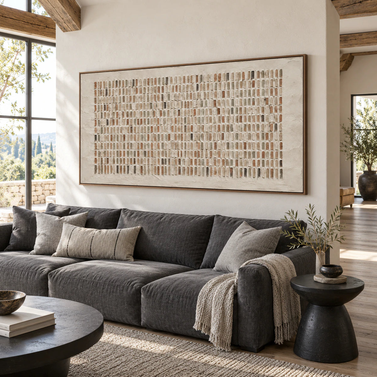Tactile-Register as the focal point above a bright living room seating arrangement.