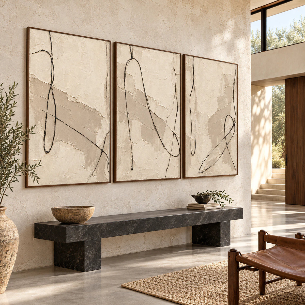 Tactile-Script triptych at gallery scale in a bright architectural foyer.