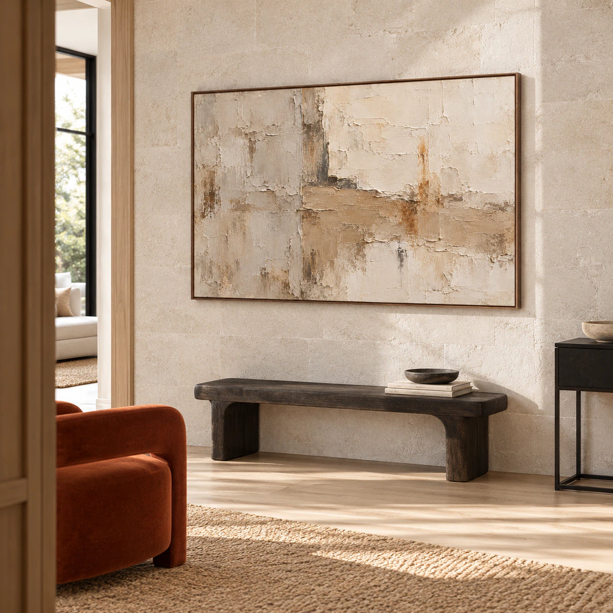 Textured abstract artwork at gallery scale in a bright, open foyer.