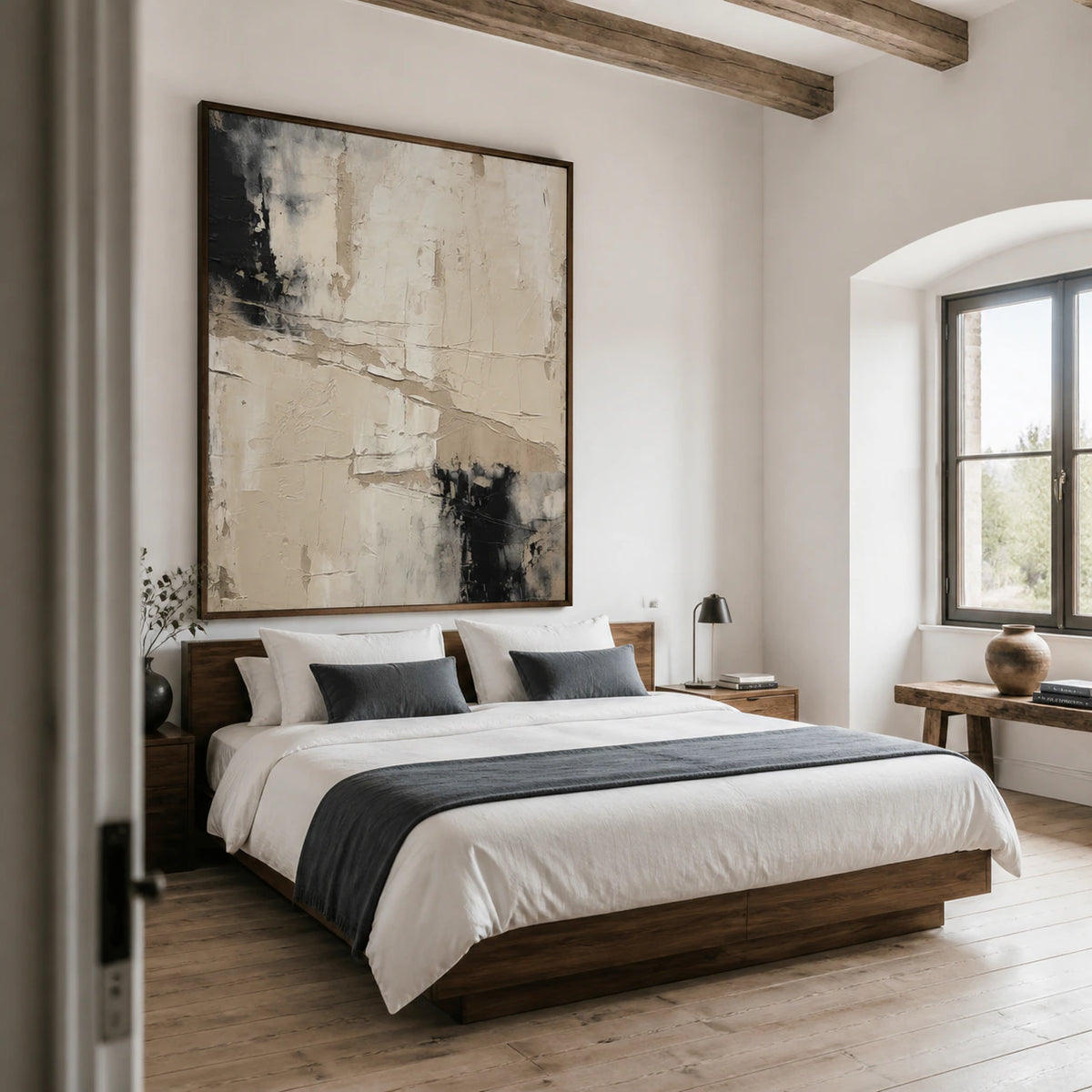 Quiet bedroom with the vertical textured abstract painting displayed prominently above a low bed.