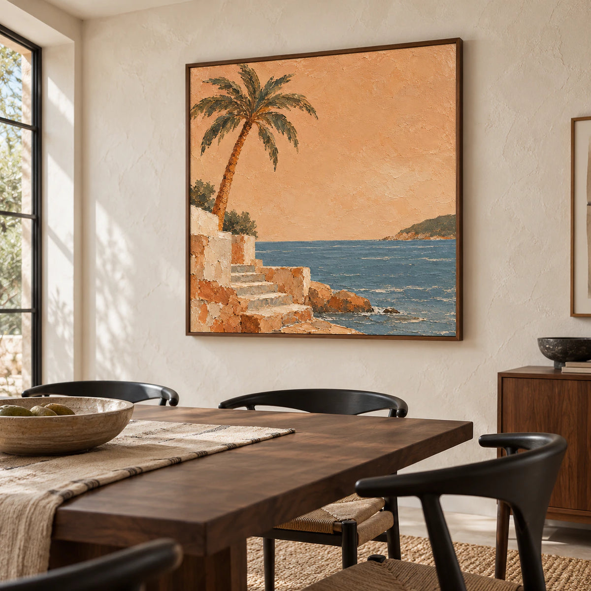 Square coastal artwork anchoring a refined dining room with a dark walnut table, sculptural chairs and soft daylight.