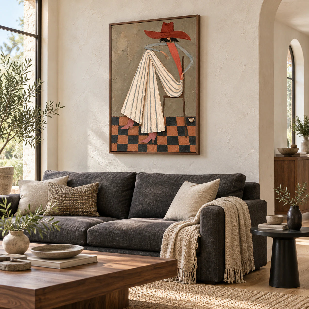 Terracotta-Interlude above a restrained sofa in a bright living room.