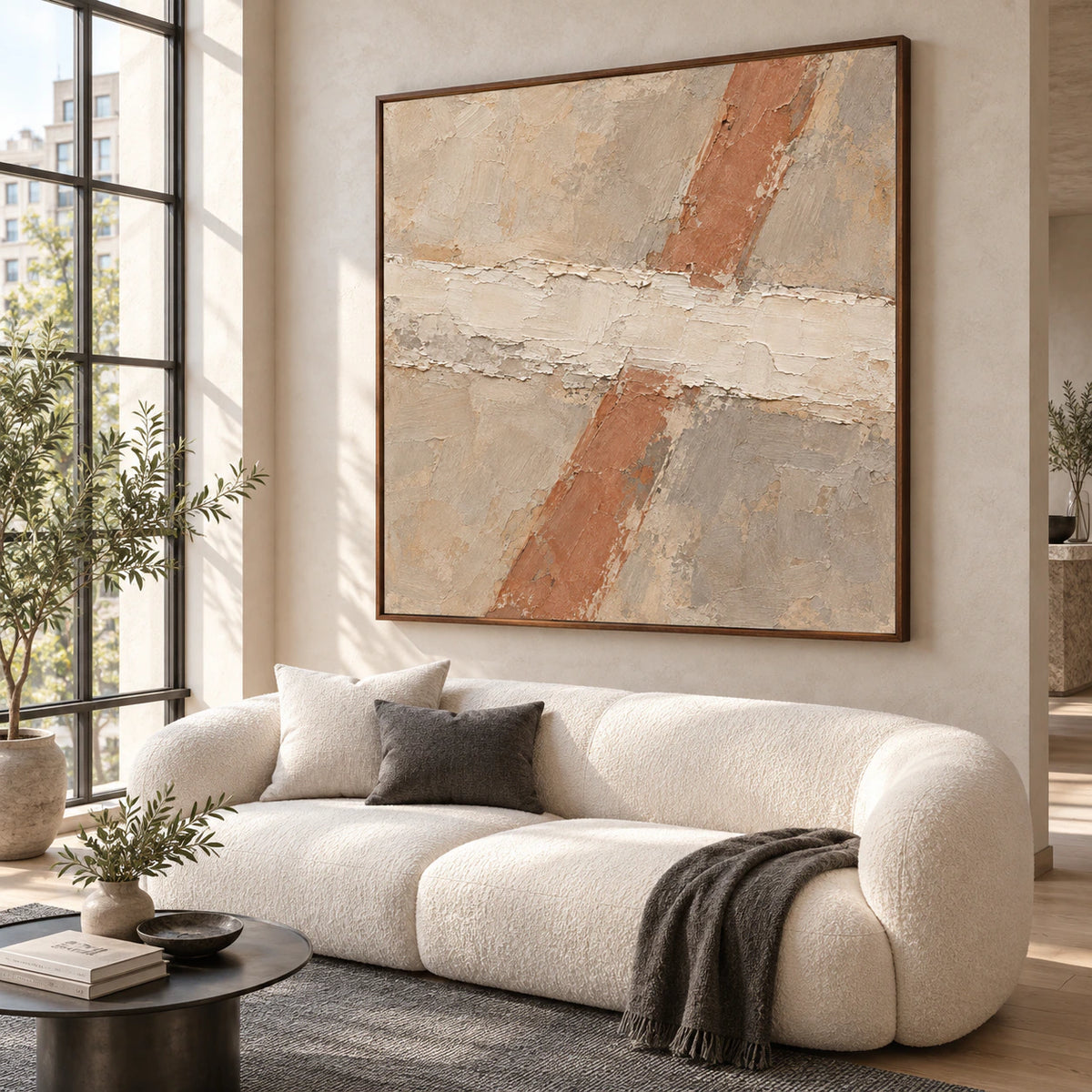 Terracotta-Span as the focal artwork above a sofa in a bright living room.