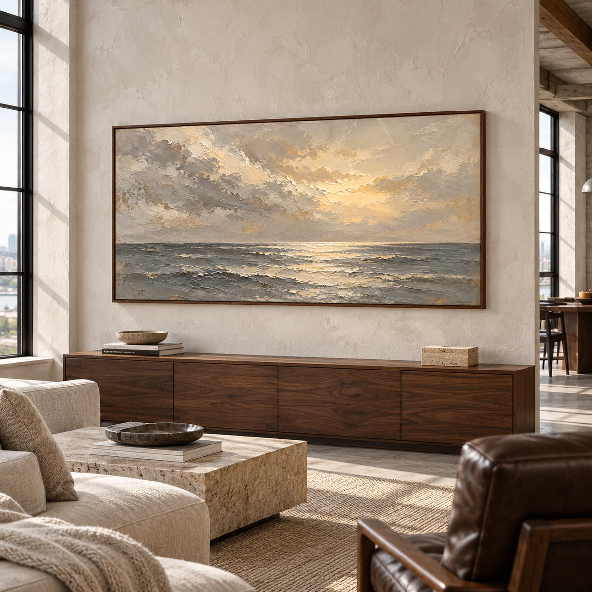 Monumental textured seascape displayed in an expansive loft interior with tall windows and restrained furnishings.