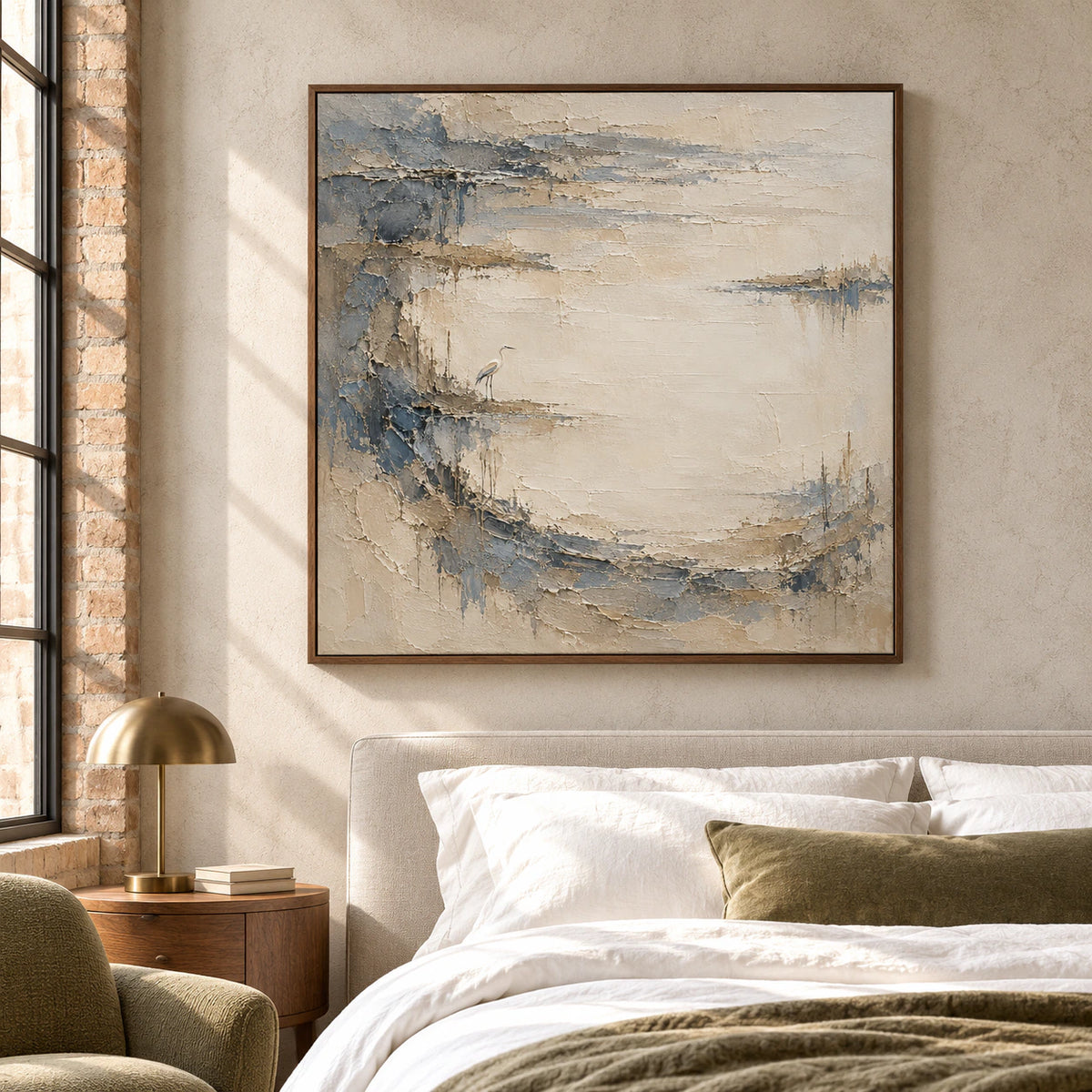 Square Tidal Heron artwork above a simple bed in a quiet, naturally lit bedroom.