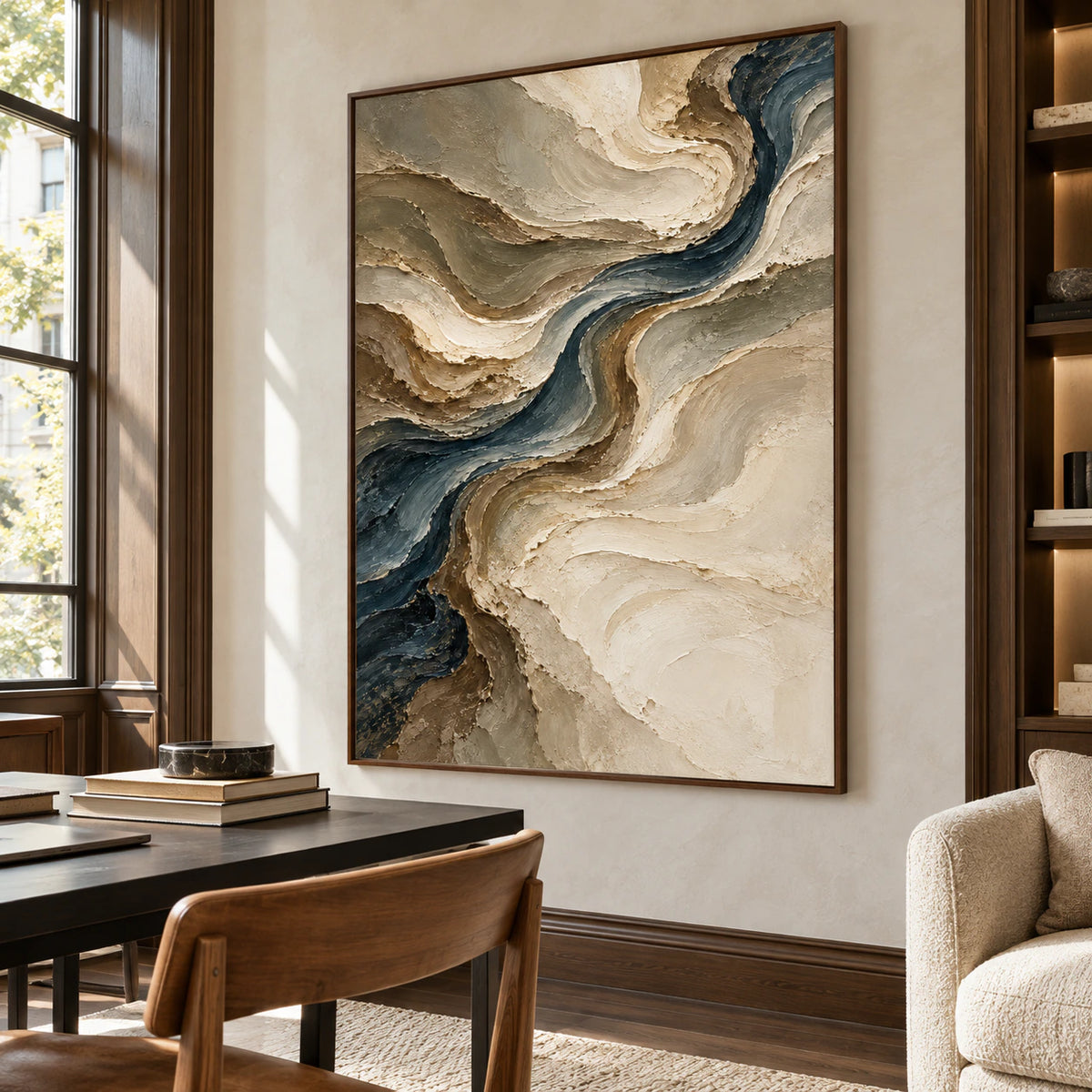Large vertical painting in an airy home office with a clean writing desk, open shelving and soft natural light.